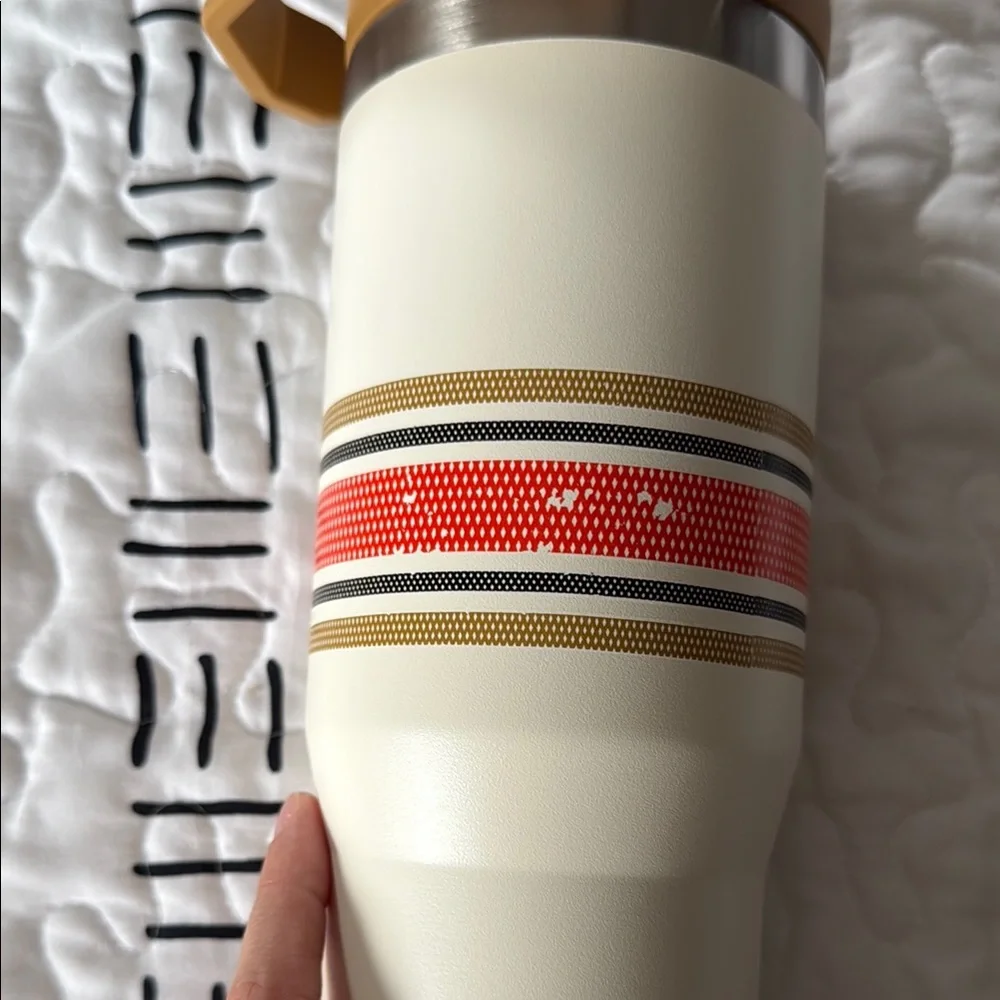 Stanley Cream Travel Tumbler with Mustard Handle and Red Accent Stripes